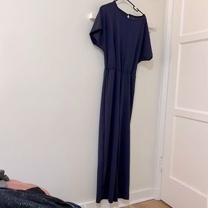 Deep purple, wide-leg jumpsuit. Stretchy material.